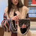 Detail of grey plush coin purse in soft faux fur texture with a pink zipper pull loop - Lamb Wool Heart Grey