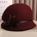 Vintage wine red wool cloche hat with a black leather bow and faux fur ball accent - M(56-58cm) / Burgundy