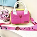 Pink and yellow color-block crossbody bag with wide strap and metallic P-logo detail - Rose Red