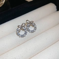 Elegant bow-shaped silver stud earrings featuring sparkling crystals and delicate pearls - S925 Silver Pin / Silver Rhinestone Bow