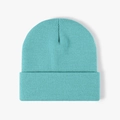 Minimalist double-layered knitted beanie in bright mint blue with a classic cuffed design - 4-Seam Cyan Blue