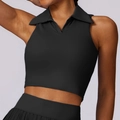 Completo sportivo nero con crop top polo senza maniche e gonna a pieghe da tennis - Nero Premium / S