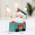 Miniatura di Babbo Natale in una confezione regalo verde per decorazioni natalizie - Babbo Natale in scatola regalo