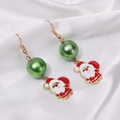 Christmas Santa Claus drop earrings with green beads and gold hooks on white silk background - 63. Green Ball Santa Claus Earrings