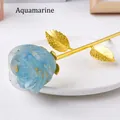 Aquamarine resin rose ornament with gold foil flakes and metallic golden stem - Aquamarine - Gold Base