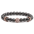 Detailed shot of black natural stone beads bracelet with rose gold pavé crystal charm - Rose Gold Zircon Ball