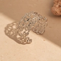 Detailed view of silver hollow chain-link open ring featuring a polished metal finish - Silver Anchor Link Hollow Style