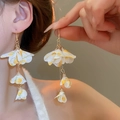Detail of long floral drop earrings with yellow and white chiffon petals and gold hooks - Style 26 Ear Hook