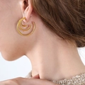 Schicke 18K vergoldete Triple-Creolen mit gedrehten und glatten strukturierten Ringen - Gold