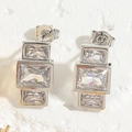 Close-up of geometric silver stud earrings with triple stacked rectangular cubic zirconia - Three Rhinestones Silver (ES2308-2)