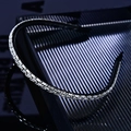 Close-up of elegant thin headband featuring sparkling crystals on a dark surface - Synthetic White Glass