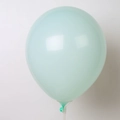 Light blue latex balloon inflated on a white plastic support stand for party decoration - 10 Inch 2.2g Macaron Green