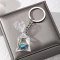 Creative resin tropical fish bag keychain with transparent water bag charm and silver ring - Yellow Blue Fish