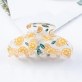 Detail of transparent acrylic hair claw featuring printed lemon slices and green leaves - Orange Lemon Hair Claw - 9cm