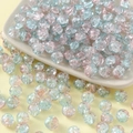 Macro shot of 10mm cracked texture glass beads in light blue and pink for DIY jewelry - 10mm / Light Blue Pink Gradient