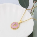 Golden round necklace featuring pink shell inlay with letter P detail - Pink-P