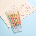 Set of 6 rainbow gradient highlighters with transparent barrels on a notebook - Glitter Set - 6PCS Boxed