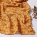 Ginger yellow swaddle blanket with geometric diamond patterns made of soft cotton - Ginger Geometric (S161)