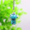 Handcrafted turquoise mushroom pendant with silver wire wrap on a metal necklace chain - Turquoise Silver-tone