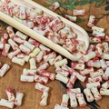 Macro detail of red and white bamboo-shaped glass beads on a bamboo spoon for DIY jewelry - Crimson (Beige White Red)