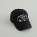 Detailed view of Santa Monica Beach 1924 embroidery on black cotton baseball cap - 52-54cm (3-8 Years) / Black