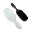 Set of two hair brushes featuring a marble finish and black with rose gold trim - Gray