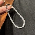 Close-up of sparkling silver bracelet with pavé rhinestones and lobster clasp closure - Silver Round Mesh Style