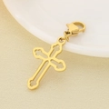 Detail view of a hollowed golden cross charm with lobster clasp on a beige fabric - 23x15mm Gold Polished Hollow Cross (KLJ6992-Z)