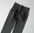 Black high-waisted seamless yoga leggings with scrunch butt lifting design for fitness - Black