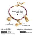 Geflochtenes Seilarmband mit goldenen Edelstahl-Anhängern wie Sonne, Roller und Kappe - Retro Motor Sonne