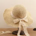 Beige hand-woven straw sun hat with elegant lace ribbon and side bow on wooden stand - L (58-60cm) / Wide Brim Lace Bow Beige