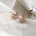 Pink heart-shaped stud earrings with shell texture and golden edge detail - Pink