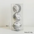 Lot de 3 boules de Noël argentées pailletées avec motifs XMAS et flocons de neige - 8cm XMAS Pack de 3 / Argenté