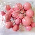Pink decorative cake toppers in various sizes with stems packaged in a clear bag - Pink Ball Mixed Set