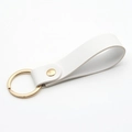 Modern white PU leather keychain with gold metal ring and rivet for elegant bag charm - White & Gold