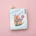 Close-up of blue PU leather mini wallet featuring cartoon capybara on a scooter - Light Blue - Dream Chaser