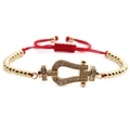 Verstellbares rotes Seilarmband mit goldener Hufeisenschnalle und weißen Zirkoniasteinen - Rotes Seil + Goldene Hufeisenschließe + Kupferperlen