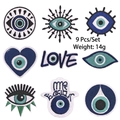 Detailed view of 9-piece blue evil eye embroidered iron-on patches showing texture - Evil Eye Patch Set (9 Pcs)