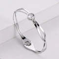 Bracciale a cerniera minimalista in acciaio al titanio argento con un singolo zircone - Color Acciaio