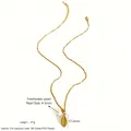 Golden titanium steel seashell necklace with freshwater pearl and wave chain detail - Golden Tooth Shell