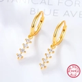 Eleganti orecchini a cerchio in argento 925 dorato con quattro zirconi trasparenti verticali - Oro/Bianco