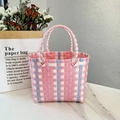 Pink and blue plaid woven picnic basket with durable handles for stylish outdoor storage - Plain Plaid / Pink Main Color Vertical Stripe