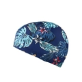 Dark blue swim cap for adults featuring vibrant tropical monstera and palm leaf patterns - Blue Leaf