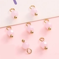Pink 4mm faceted glass beads with gold accents for DIY jewelry making and crafting - Pink Round Bead