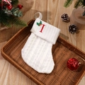 White cable knit Christmas stocking with red embroidered letter I and holly detail - Letter I