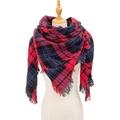 Plaid scarf with red and blue check patterns and fringed edges on a mannequin - Red and Navy Blue Plaid