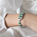 Silver open bangle featuring green and white marquise-cut zircon stones in leaf design - Green Zircon Steel Color