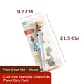 Kids blue and white training chopsticks with cartoon bull handle and silicone rings - Cow Training Chopsticks (Paper Card)