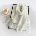 Detail of white cotton linen scarf with soft fringe edges and breathable woven texture - Creamy White