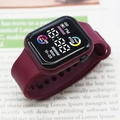 Digital sport watch with burgundy silicone strap showing heart rate and step counter data - Burgundy